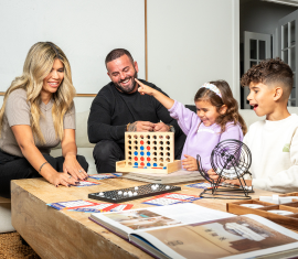 family playing board games